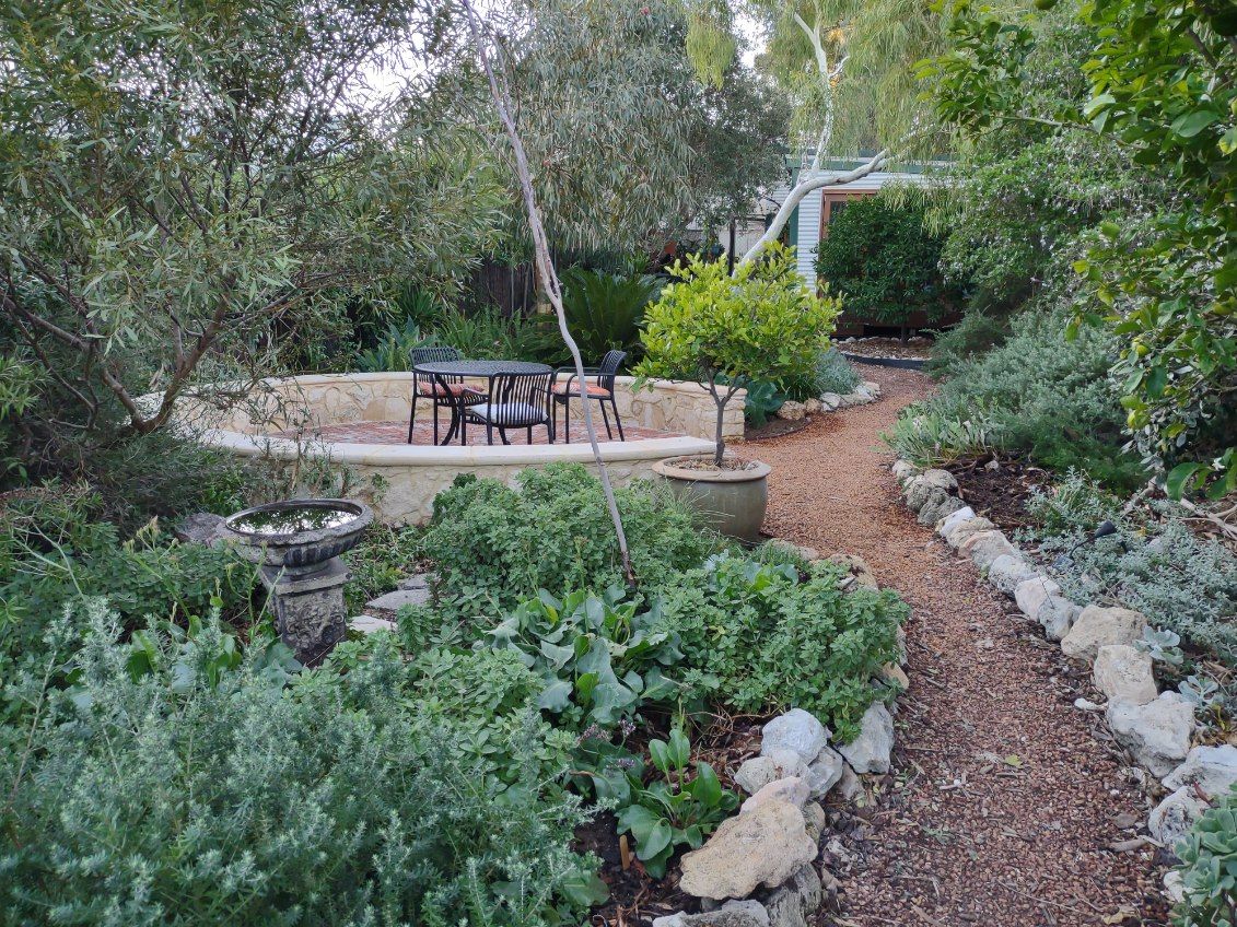 Native garden with limestone seat wall