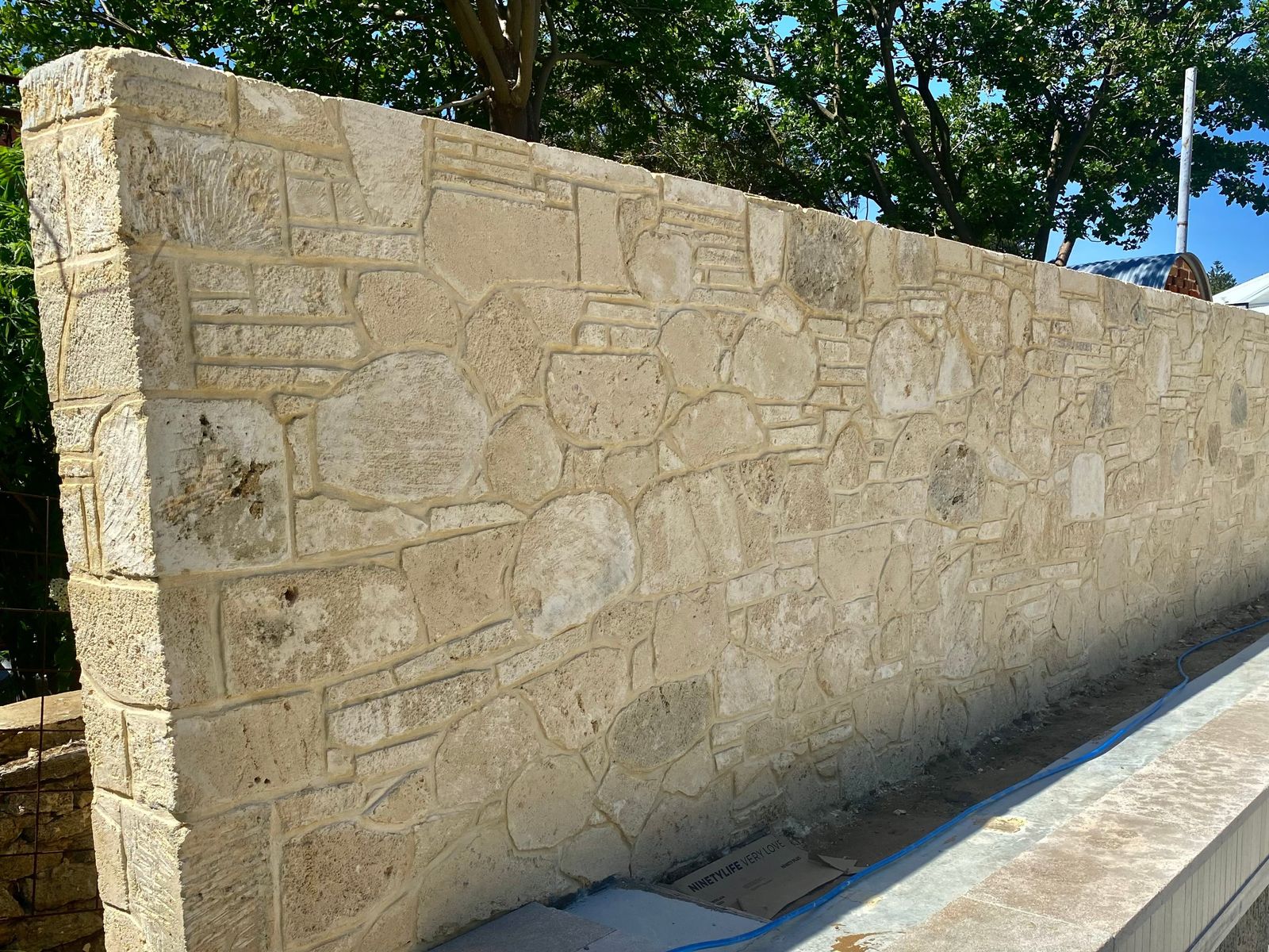 Random-rubble limestone wall